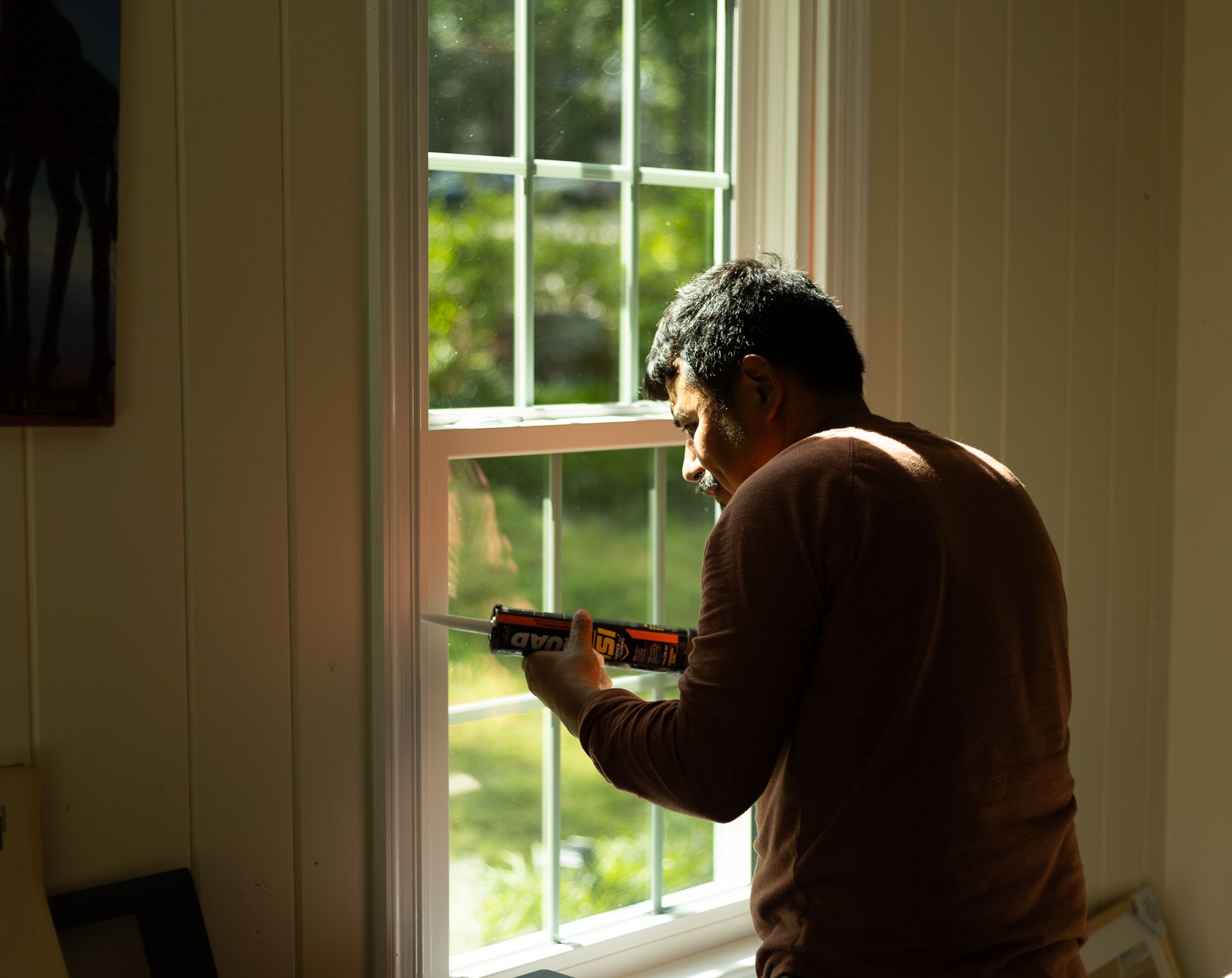 A during-installation image of a RETEX window replacement in North Chesterfield VA 23235.