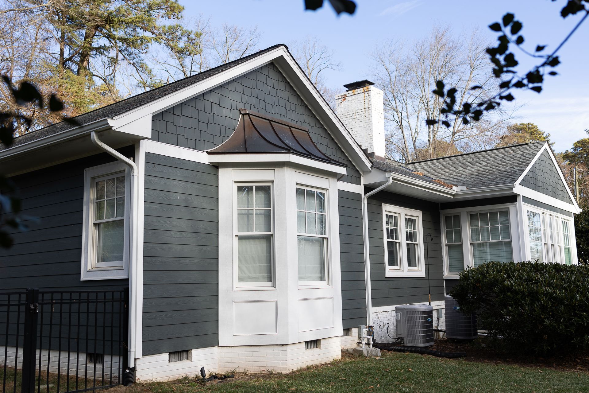 After-photo of a RETEX James Hardie fiber cement siding replacement in Richmond, VA.