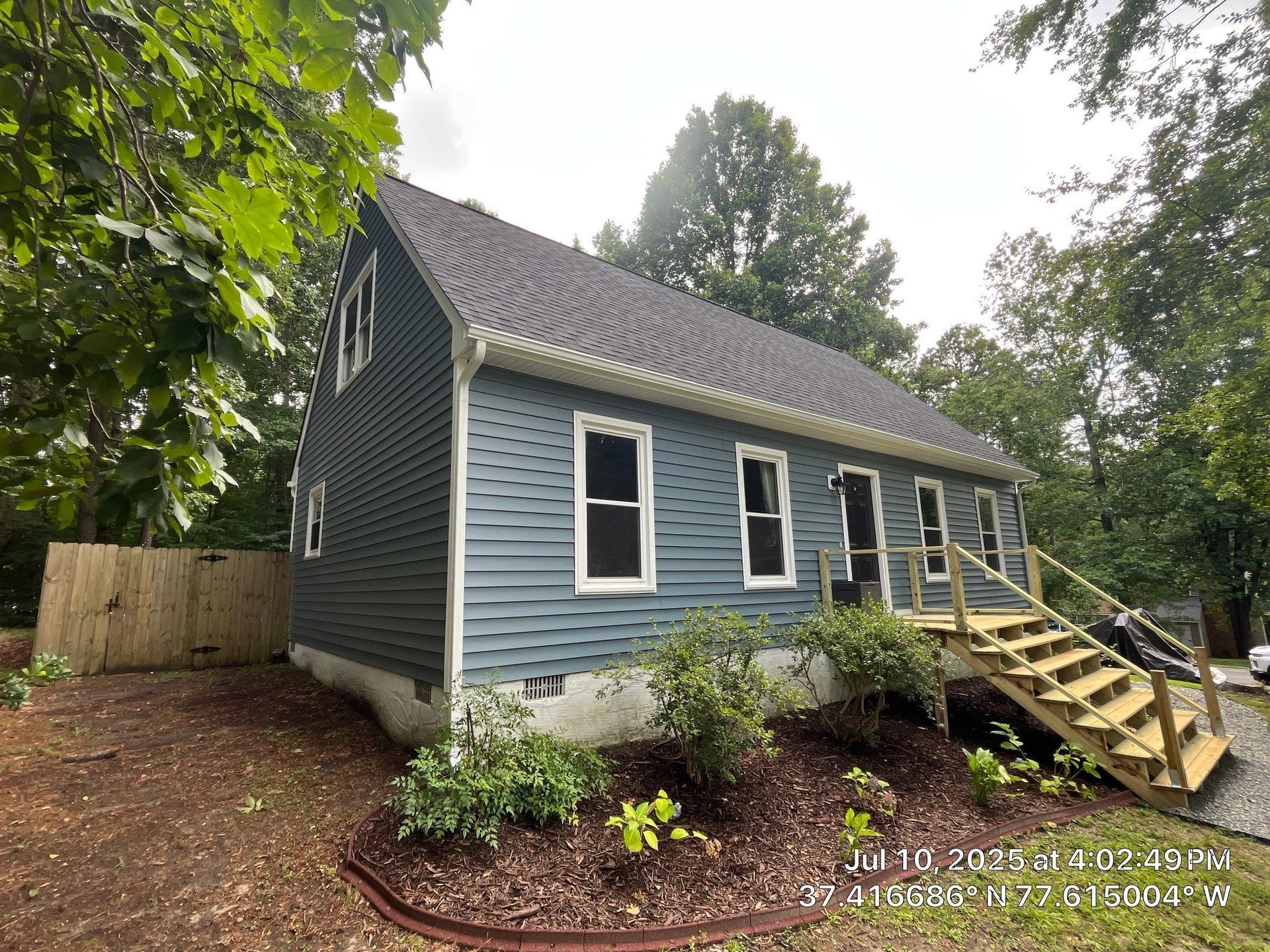A Midlothian home that RETEX replaced the roof, siding, and gutters for in June-July 2025.