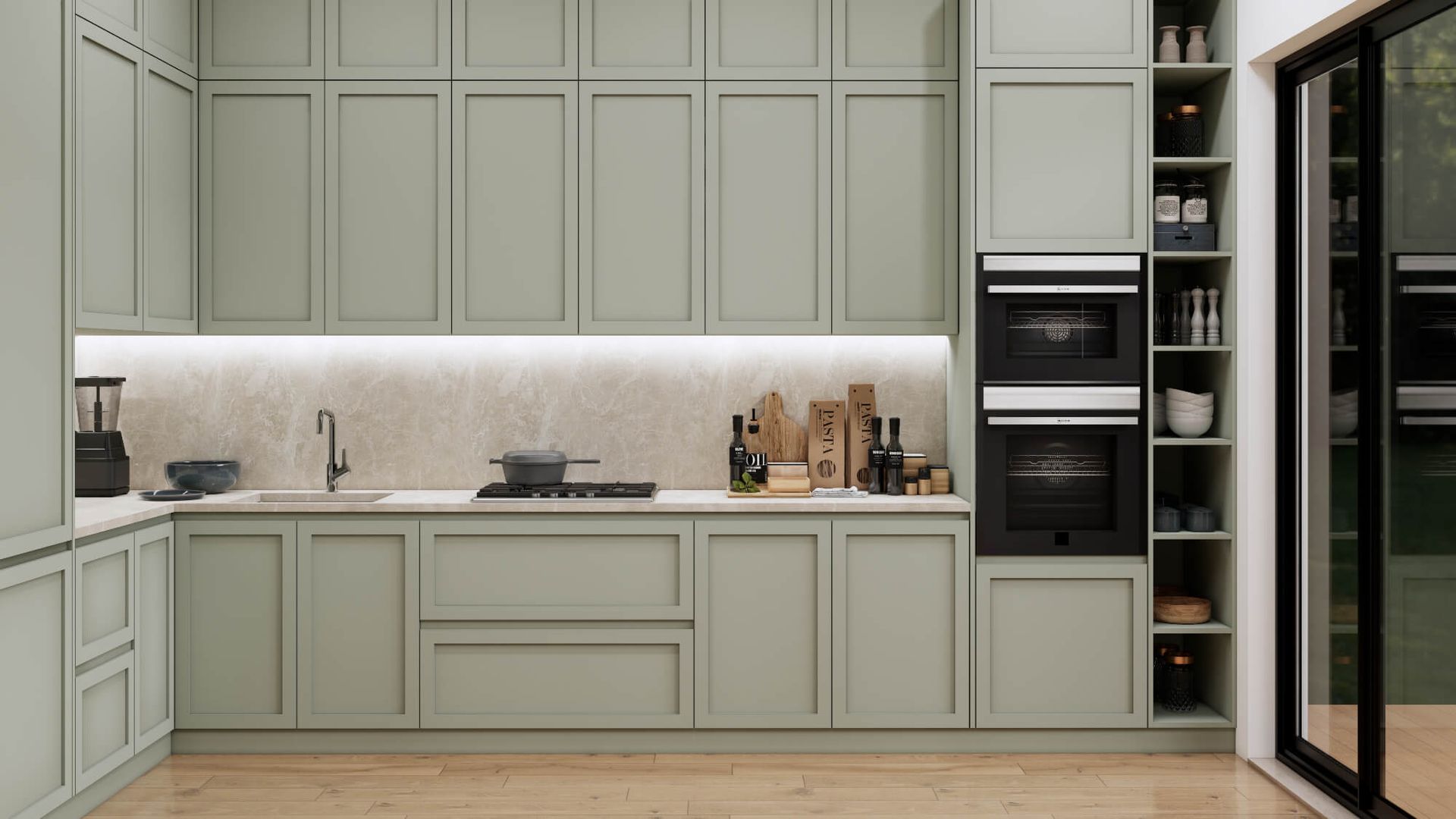 A kitchen with green cabinets and a black oven.