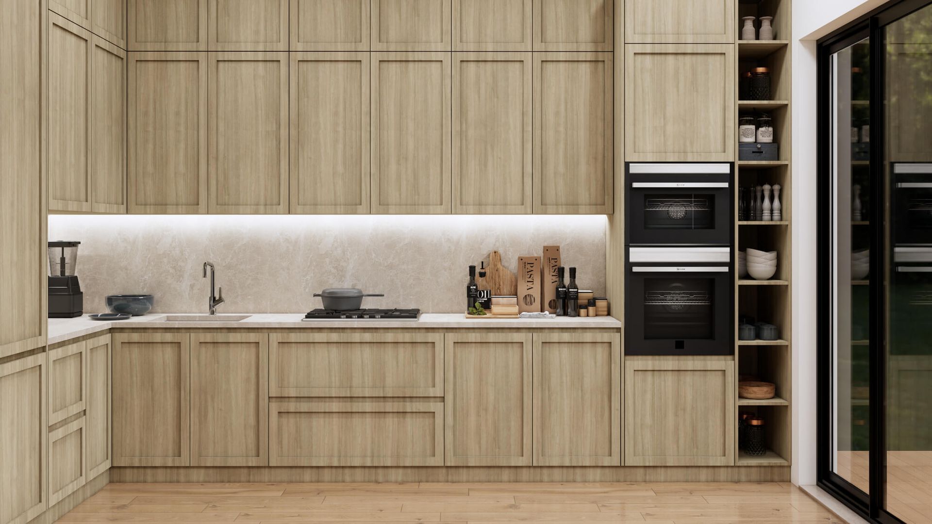 A kitchen with wooden cabinets , a sink , an oven , and a sliding glass door.