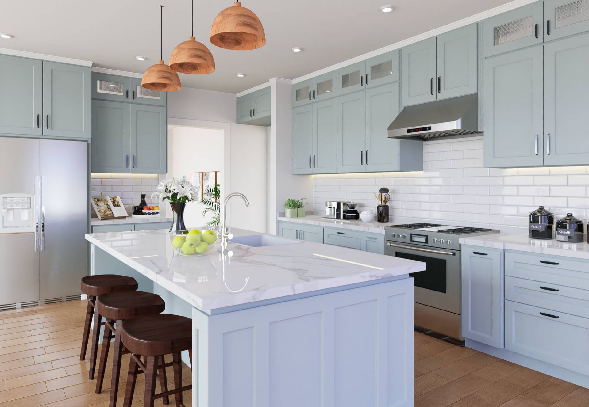 A kitchen with blue cabinets , white counter tops , stainless steel appliances and a large island.