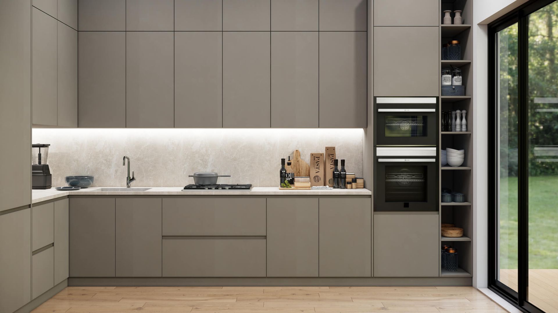 A kitchen with a sink , stove , oven , microwave and sliding glass doors.