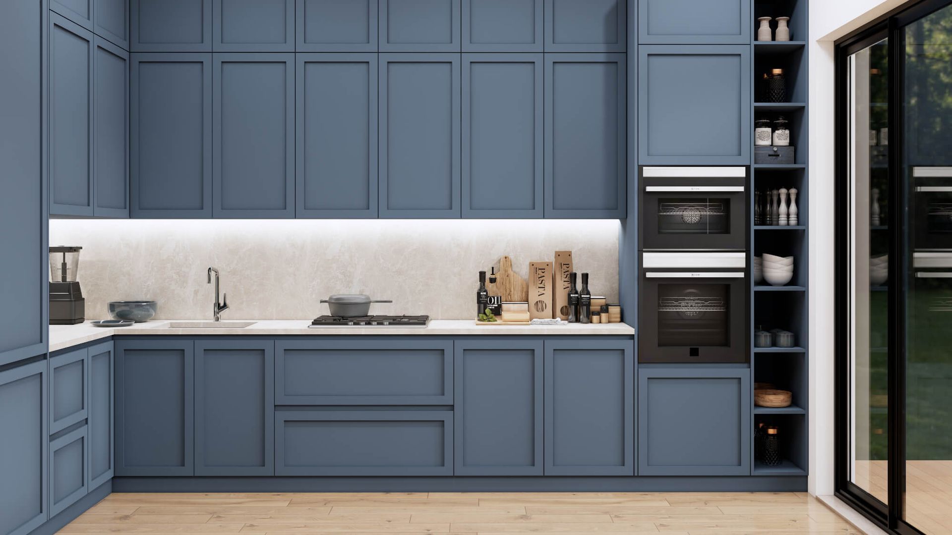 A kitchen with blue cabinets and white counter tops.
