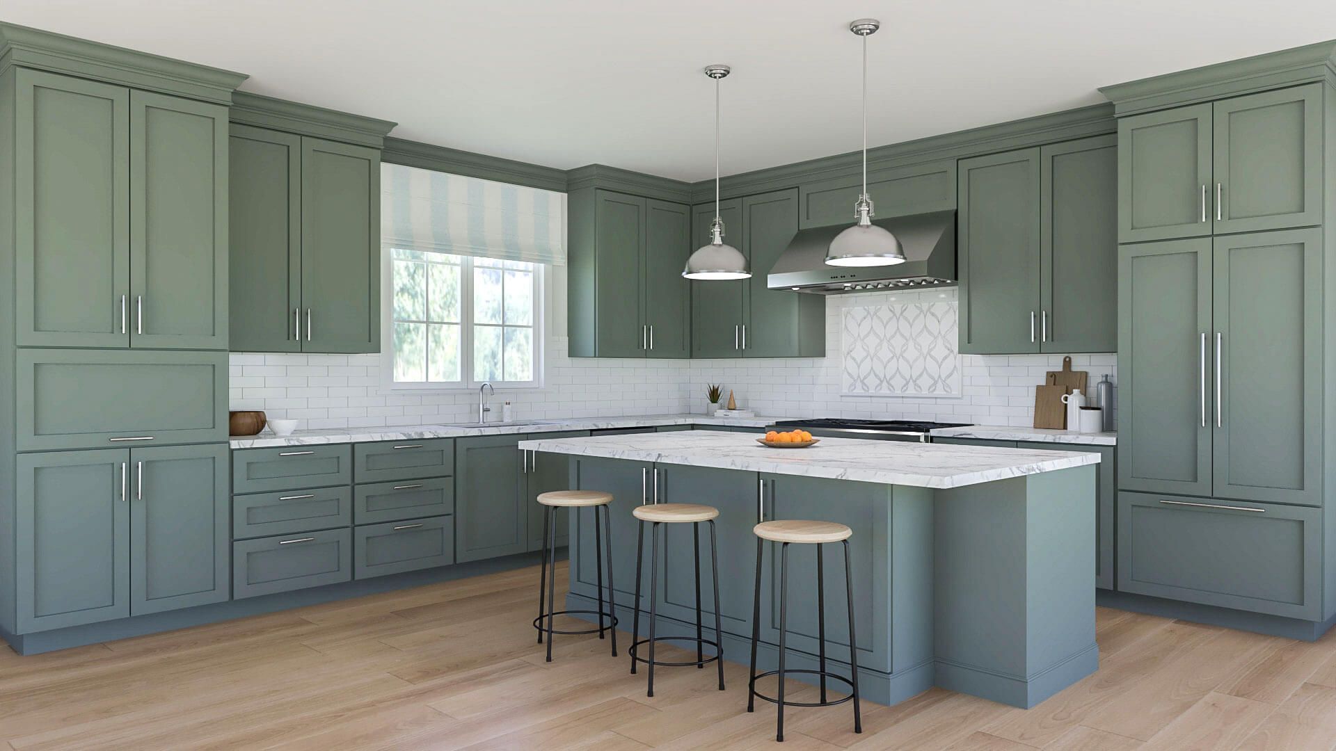 A kitchen with green cabinets , white counter tops , and a large island.