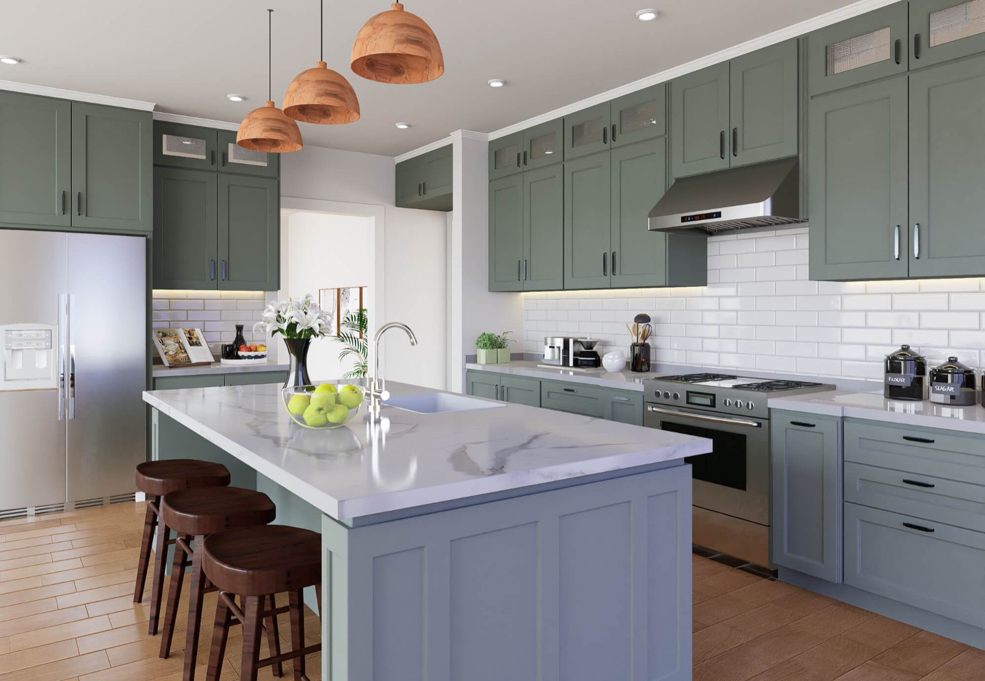 A kitchen with green cabinets , white counter tops , stainless steel appliances and a large island.