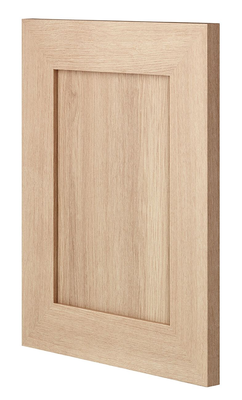 A close up of a wooden door on a white background.