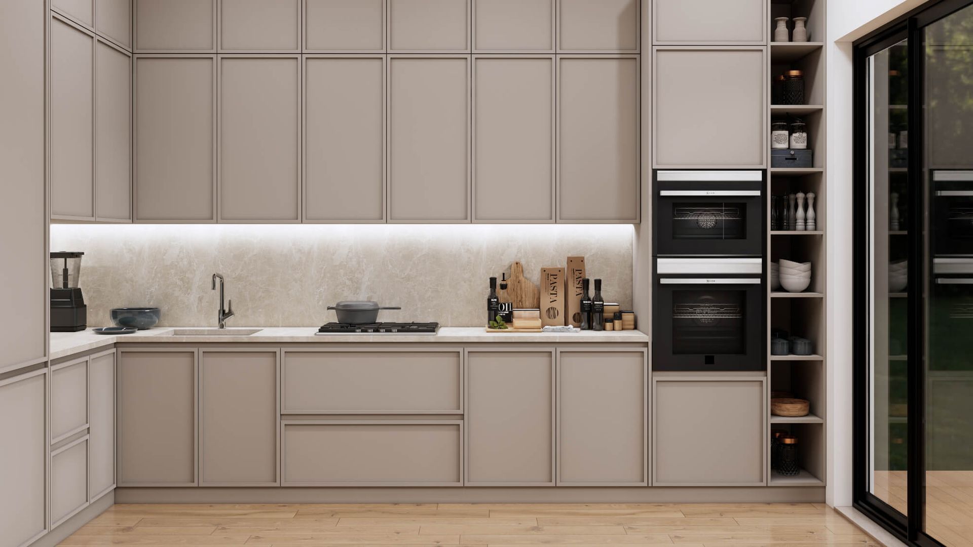 A kitchen with a sink , oven , microwave and sliding glass doors.