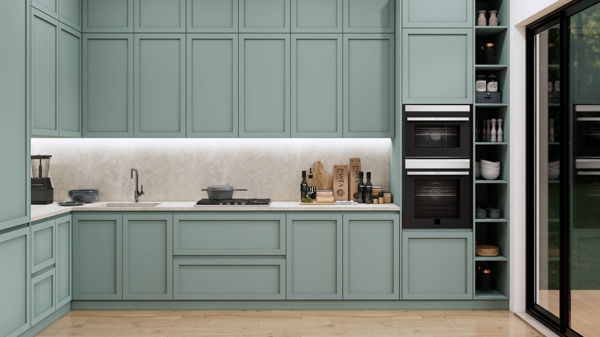 A kitchen with green cabinets and a sliding glass door.