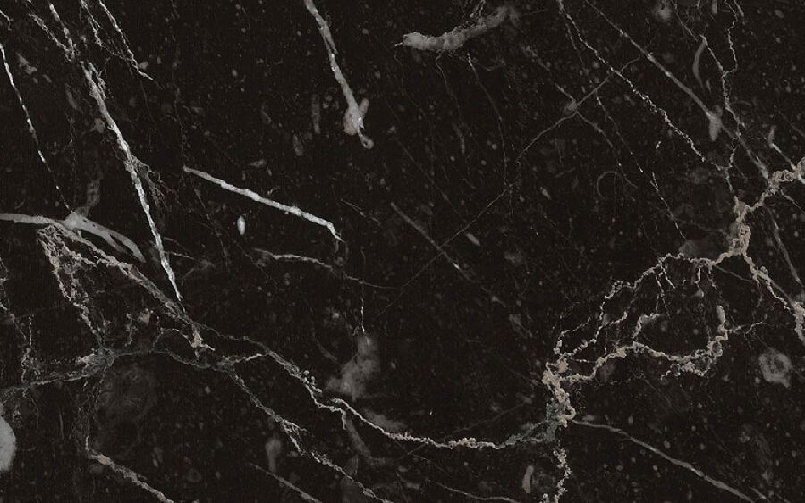 A close up of a black marble texture with white veins