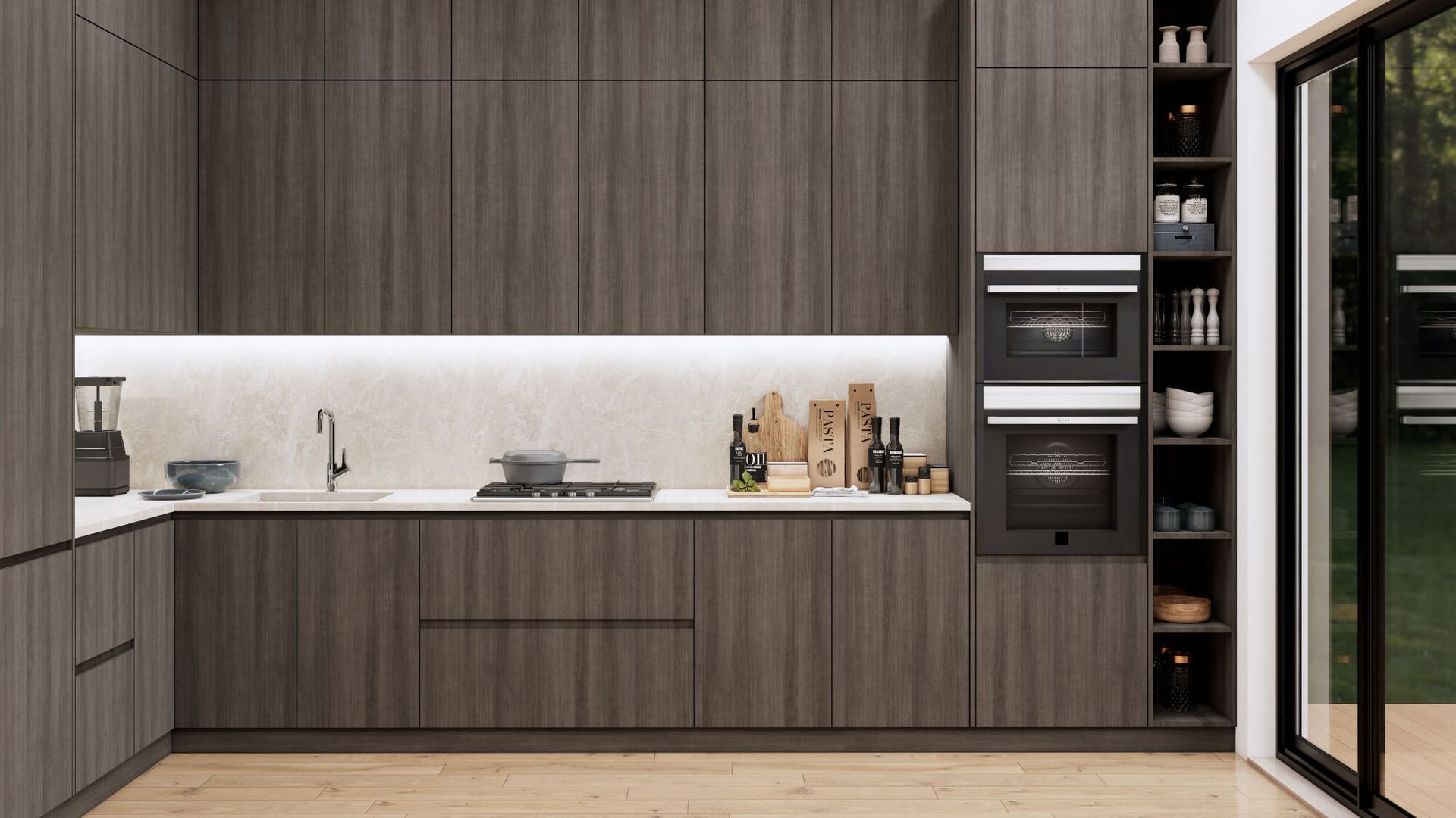 A kitchen with wooden cabinets , a sink , an oven , and a sliding glass door.