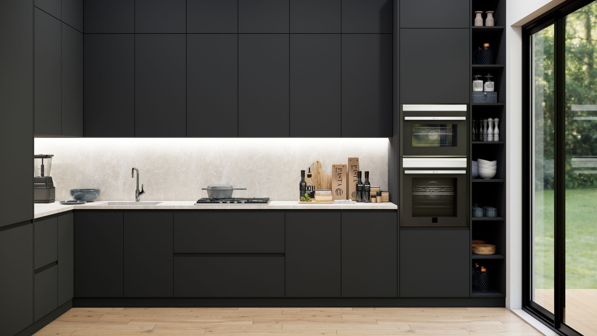 A kitchen with black cabinets and a sliding glass door.