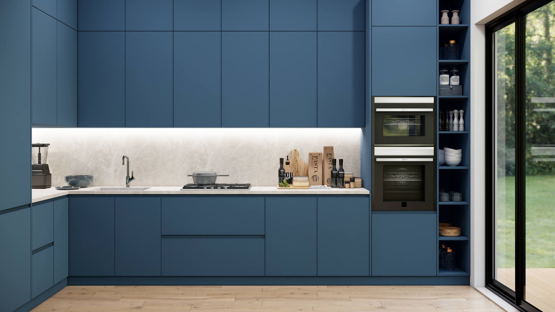 A kitchen with blue cabinets and a sliding glass door