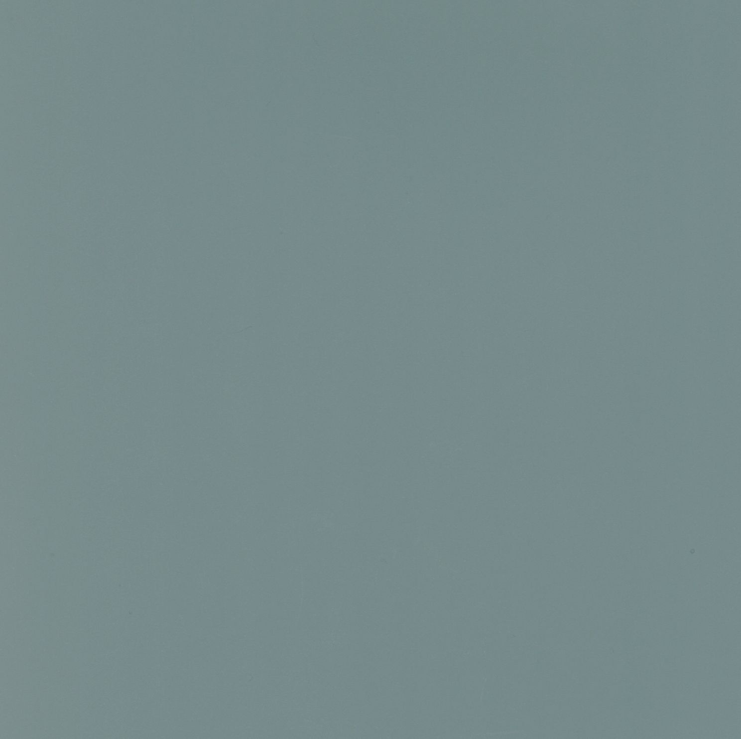 A close up of a plain grey background.