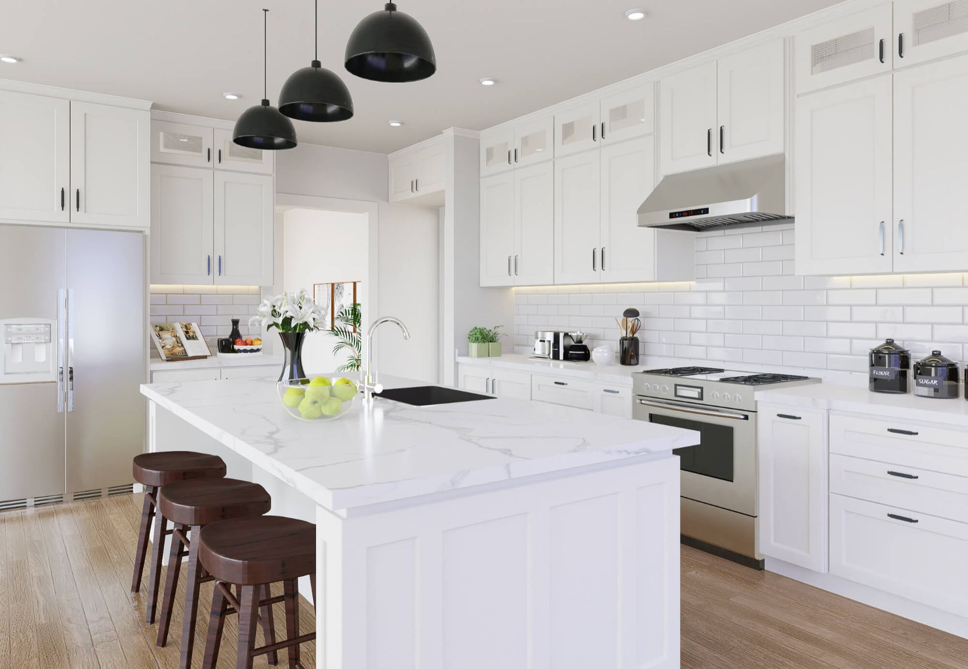 A kitchen with white cabinets , stainless steel appliances , and a large island.
