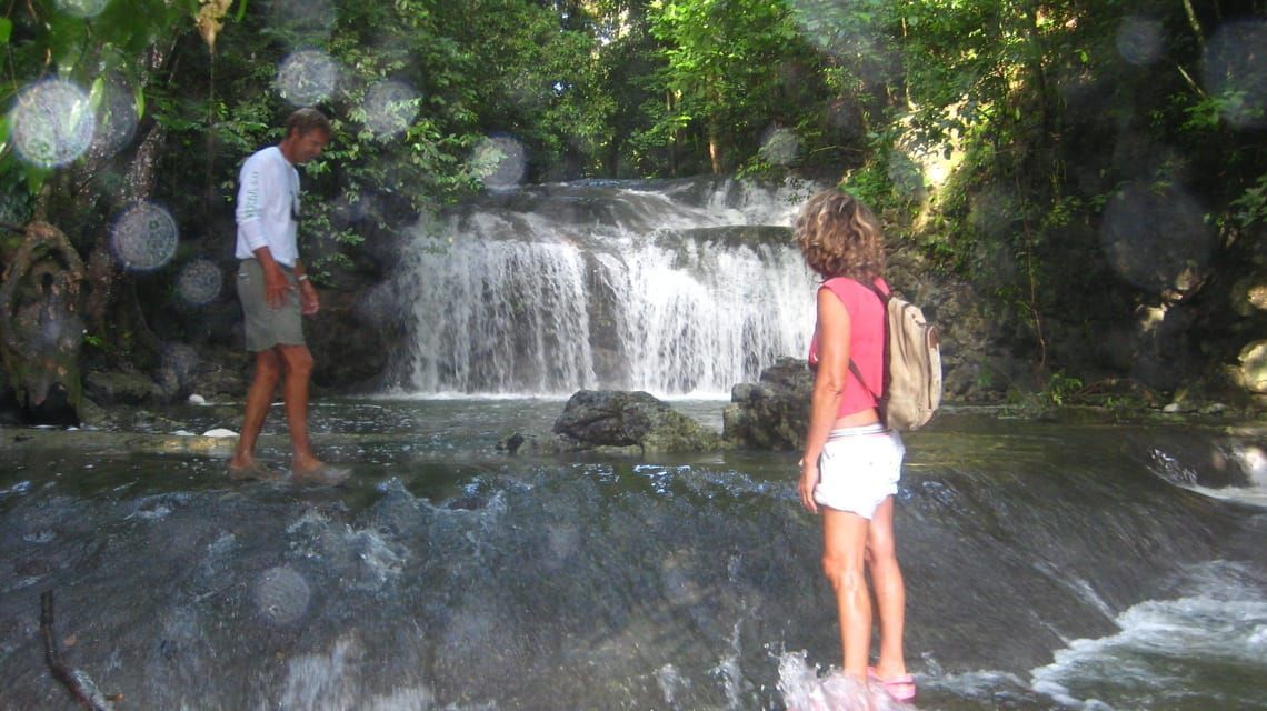 Gail and Ted Gordon hiking up waterfalls and exploring Guatemala