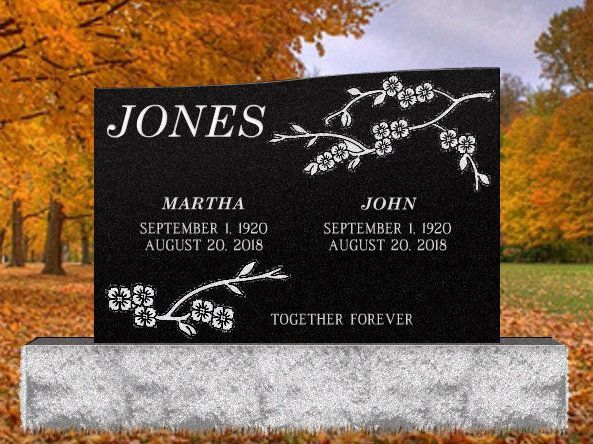 A black gravestone with the name jones on it