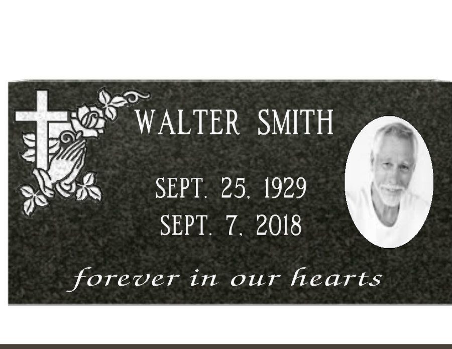 A gravestone for walter smith with a picture of him on it.
