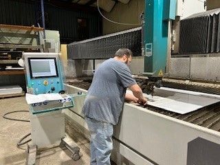 Man wearing a blue shirt — Martinsville, IN — Oliver Machine & Tool Corporation