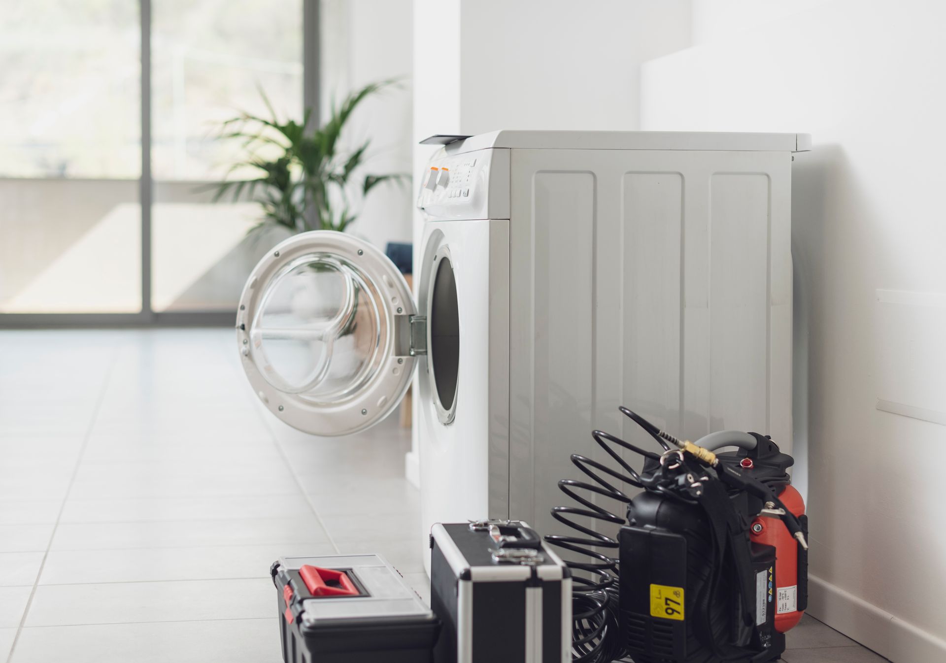 Washing Machine With Open Door, Tools in Front — Fast Tech Appliance Repairs in Newcastle, NSW