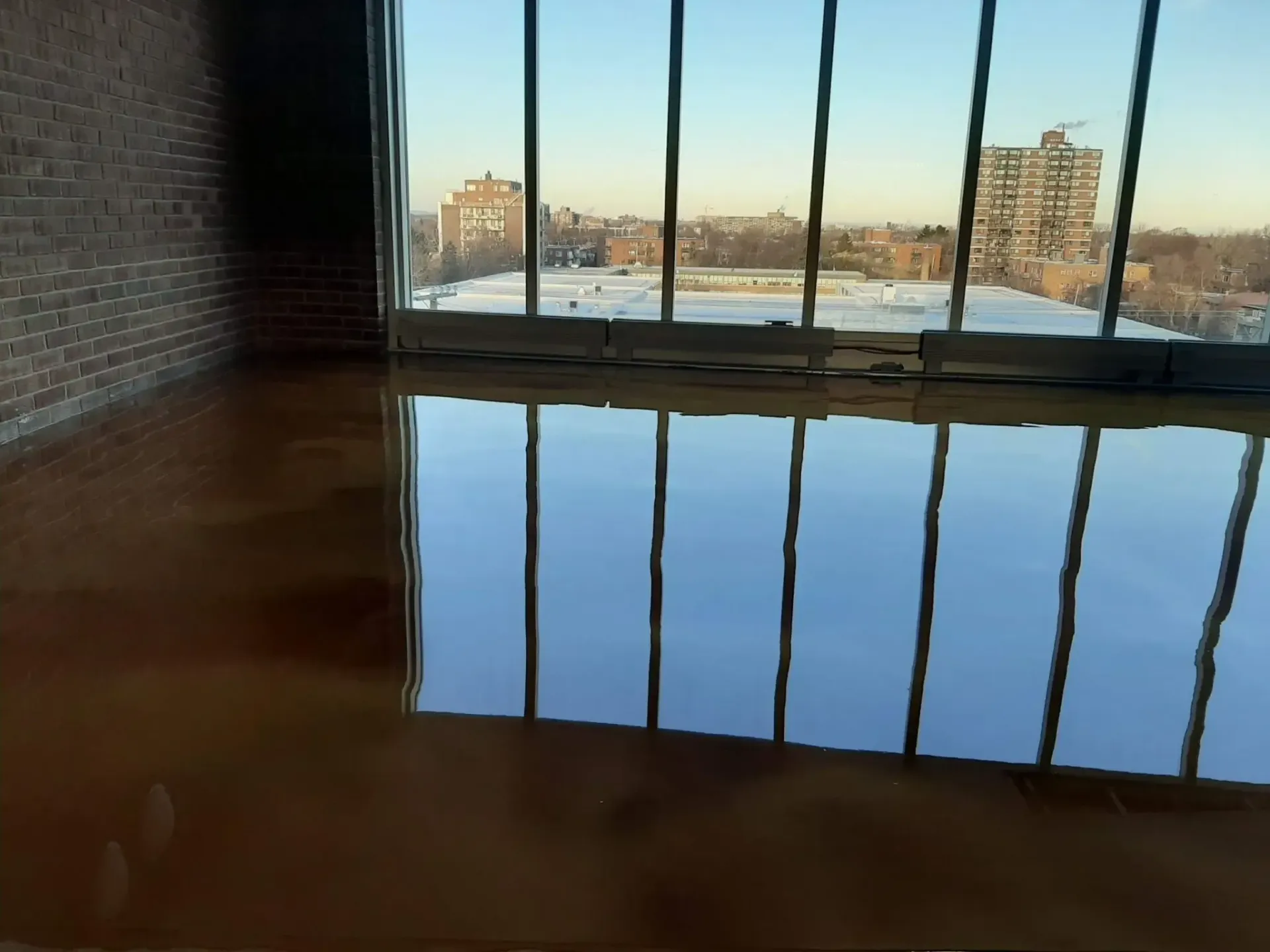 A large window with a view of a city