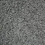 A close up of a gray carpet texture.