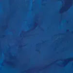 A close up of a blue background with a marble texture.