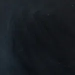 A black background with a few white dots on it