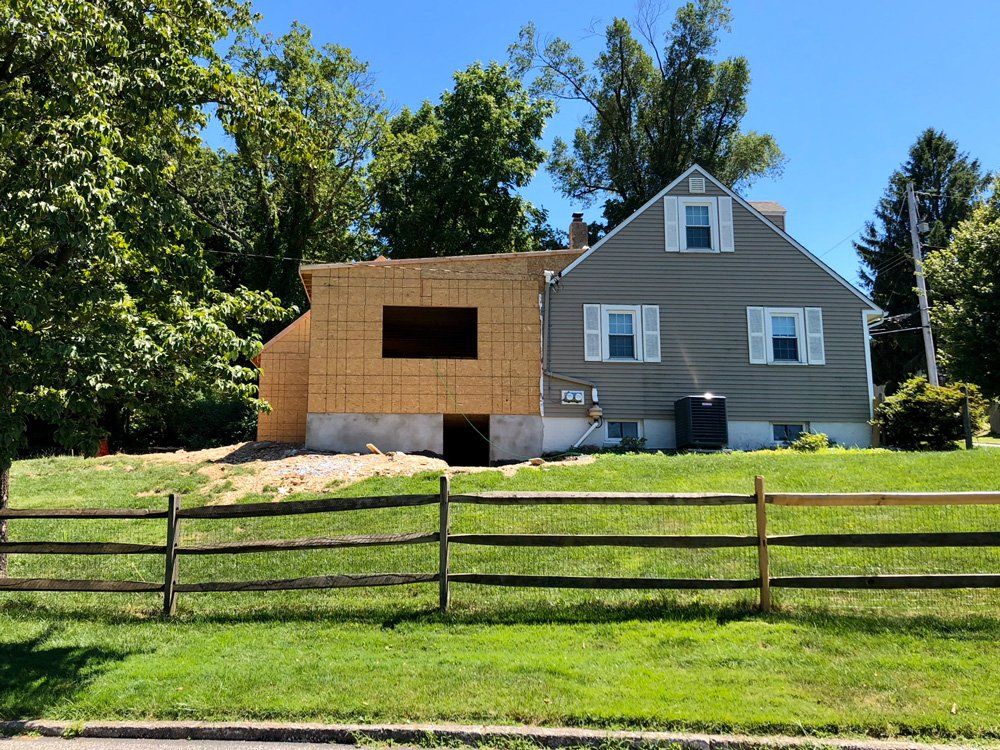 House With Fence On The Side — Parkesburg, PA — E.P. Hannum Building