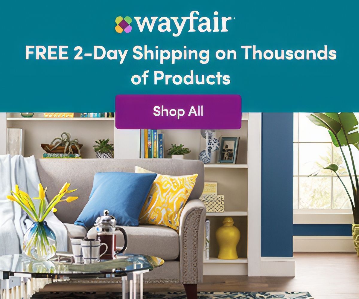 Wayfair ad: Gray couch with pillows, offering free 2-day shipping on thousands of products. Shop All button.