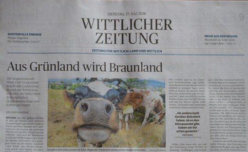 Photograph of the headline from a German newspaper, 