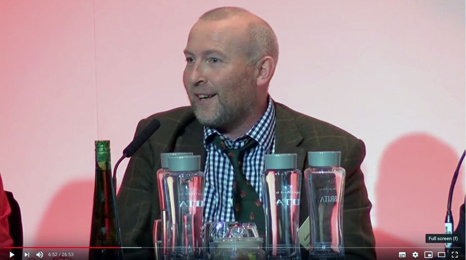 Image of Geraint Powell speaking in a panel discussion at Nuffield Conference, November 2018.