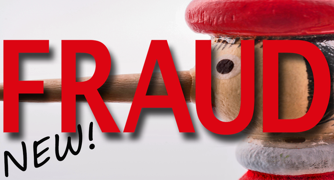 A wooden toy figure with a long Pinocchio's nose and the word 'Fraud' written in red across it.