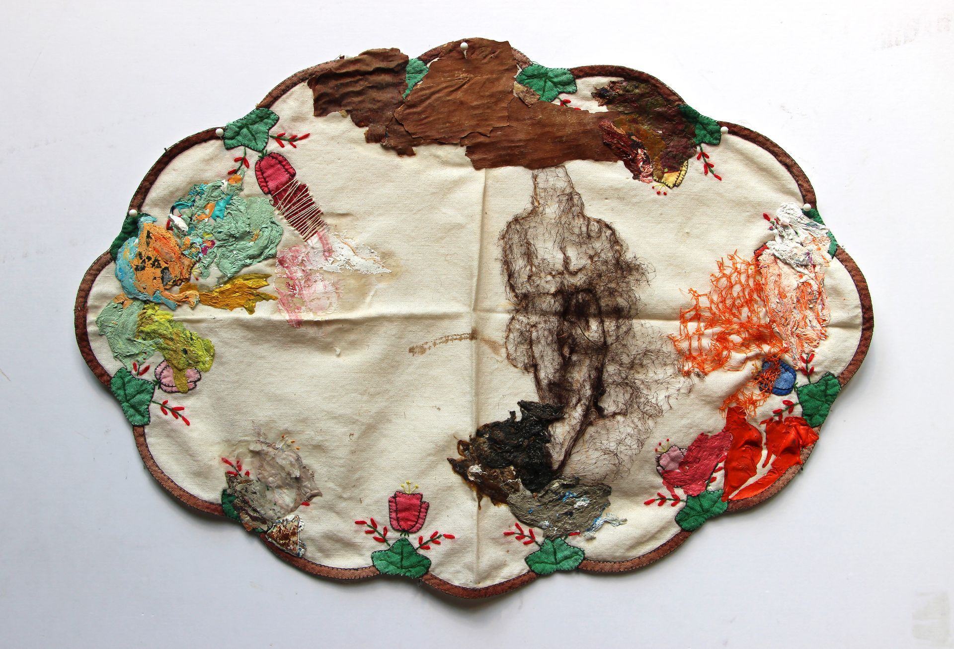 Tangled. 2020, Stitching and collage on kitchen towel, 26