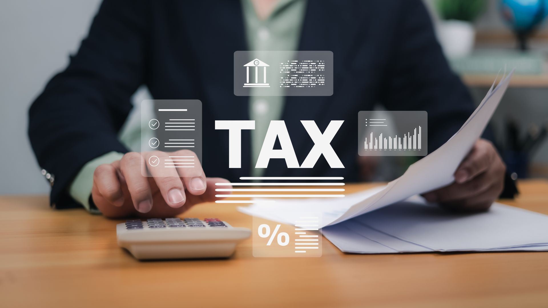 Business handshake overlaid on a city skyline, with blurred silhouettes of people.