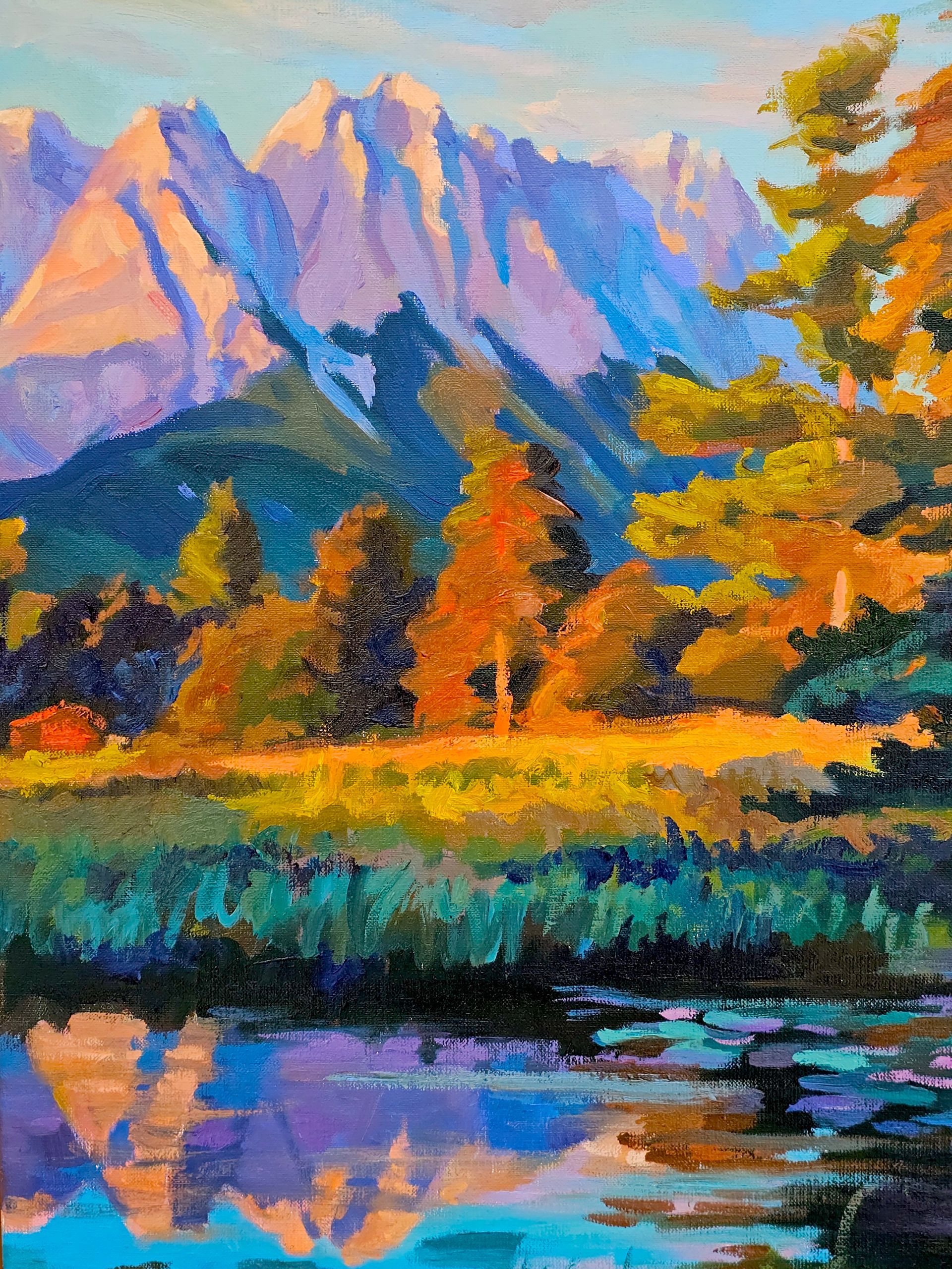 Ein ausdrucksstarkes Ölgemälde zeigt zerklüftete, sonnenbeschienene Berge, die sich über herbstlich gefärbte Bäume erheben.