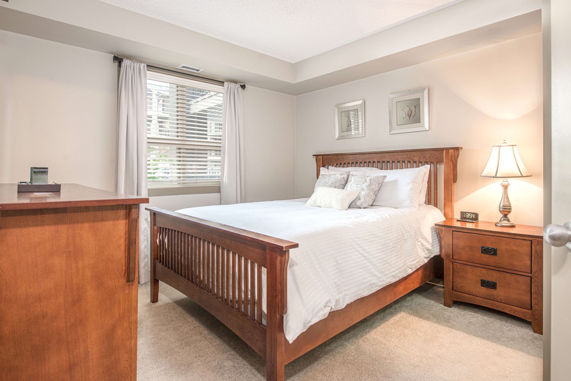 Primary bedroom at the Lake Windermere Pointe Condos in Invermere, BC managed by Aisling Baile Property Management
