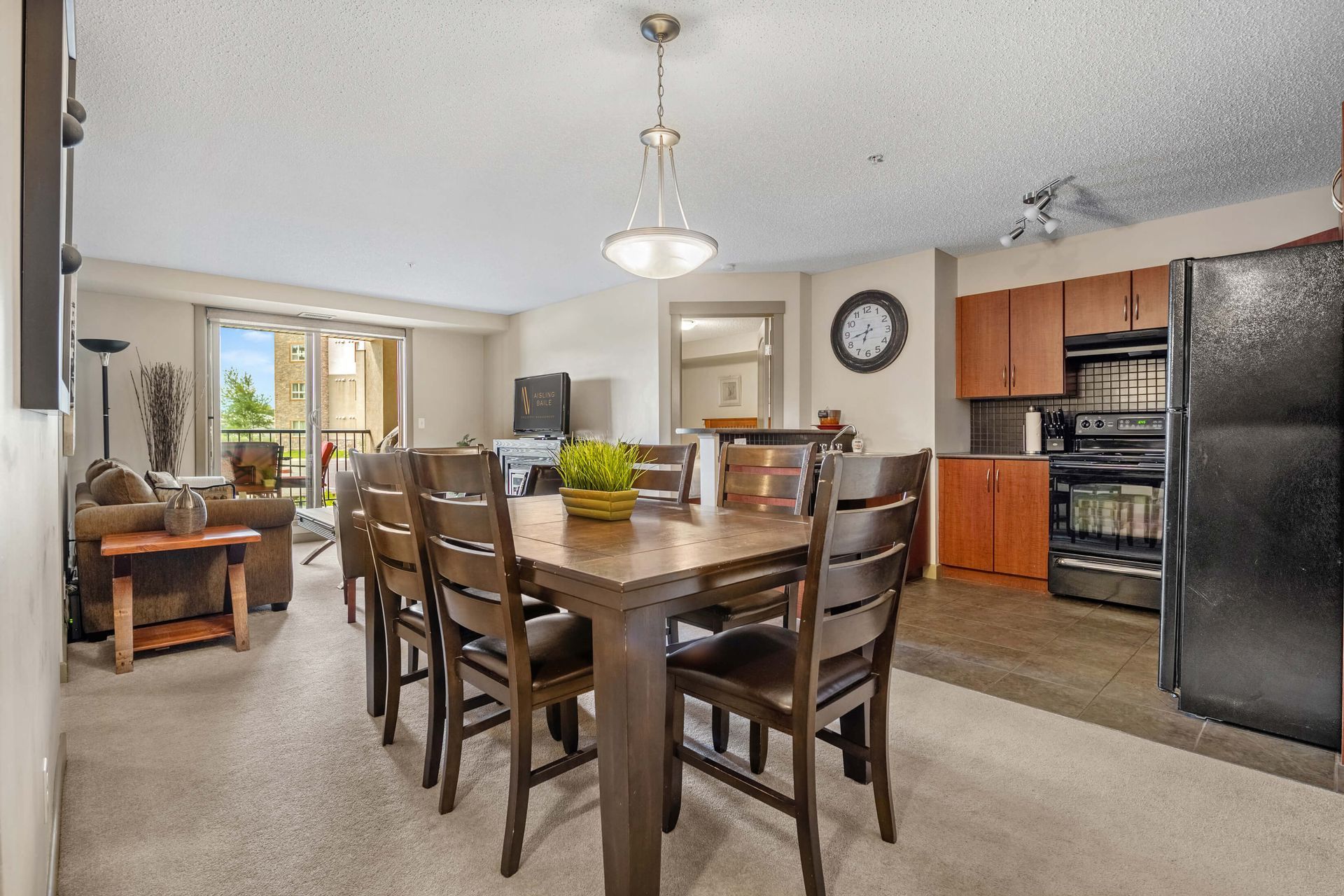 Living room and dining area at the Lake Windermere Pointe Condos in Invermere, BC managed by Aisling Baile Property Management