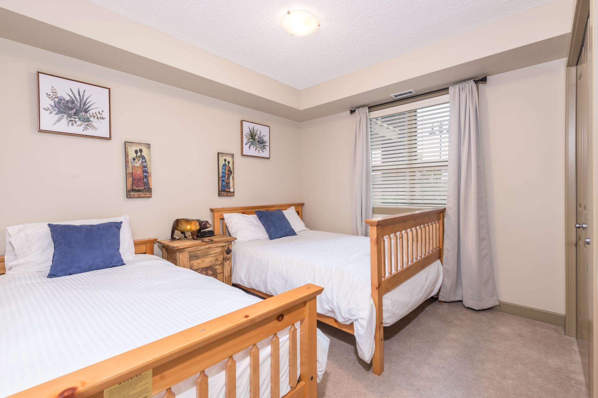 Second bedroom at the Lake Windermere Pointe Condos in Invermere, BC managed by Aisling Baile Property Management