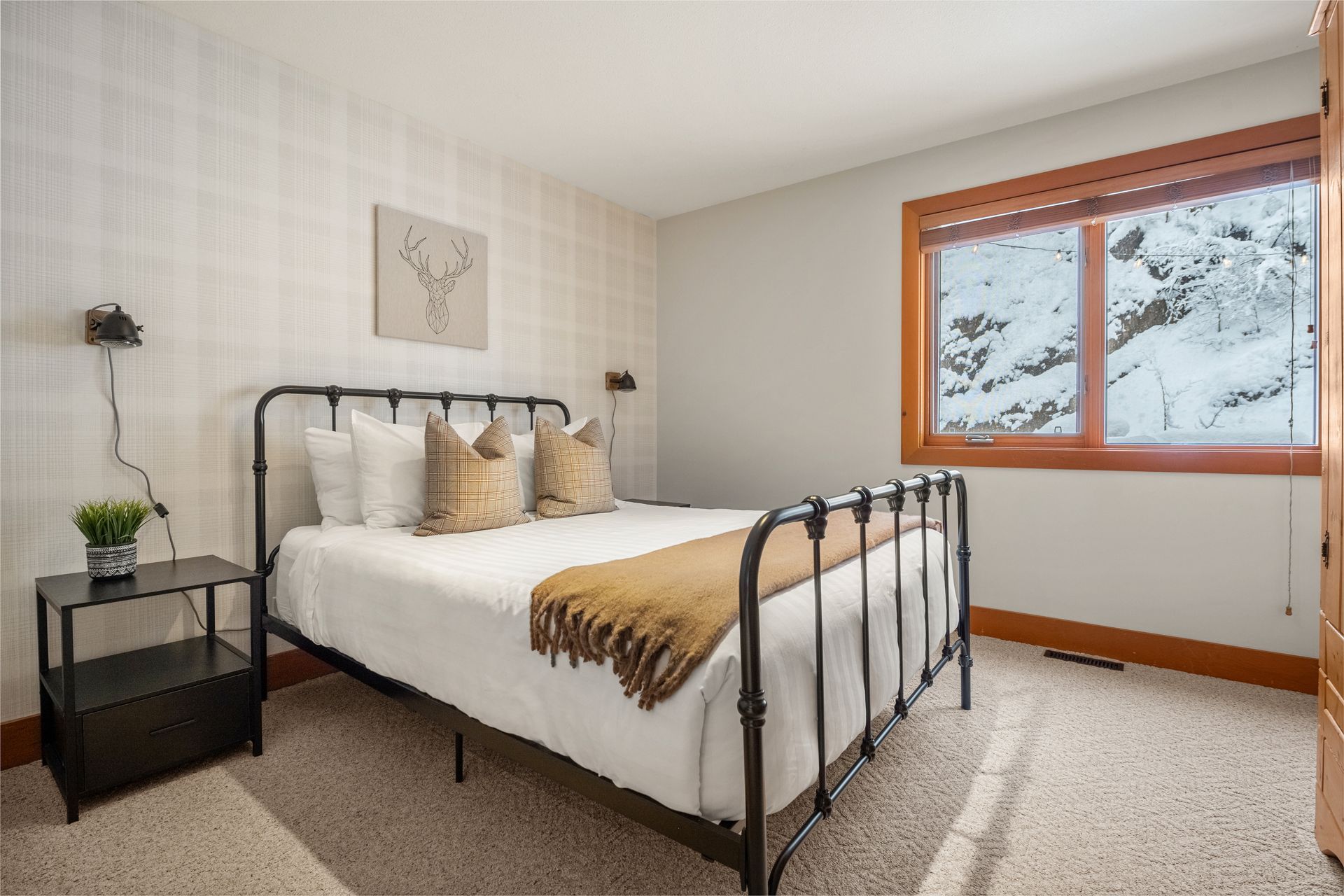 Bedroom of the Greywolf Lodge,  a golf course BC vacation rental hosted by Aisling Baile Property Management.