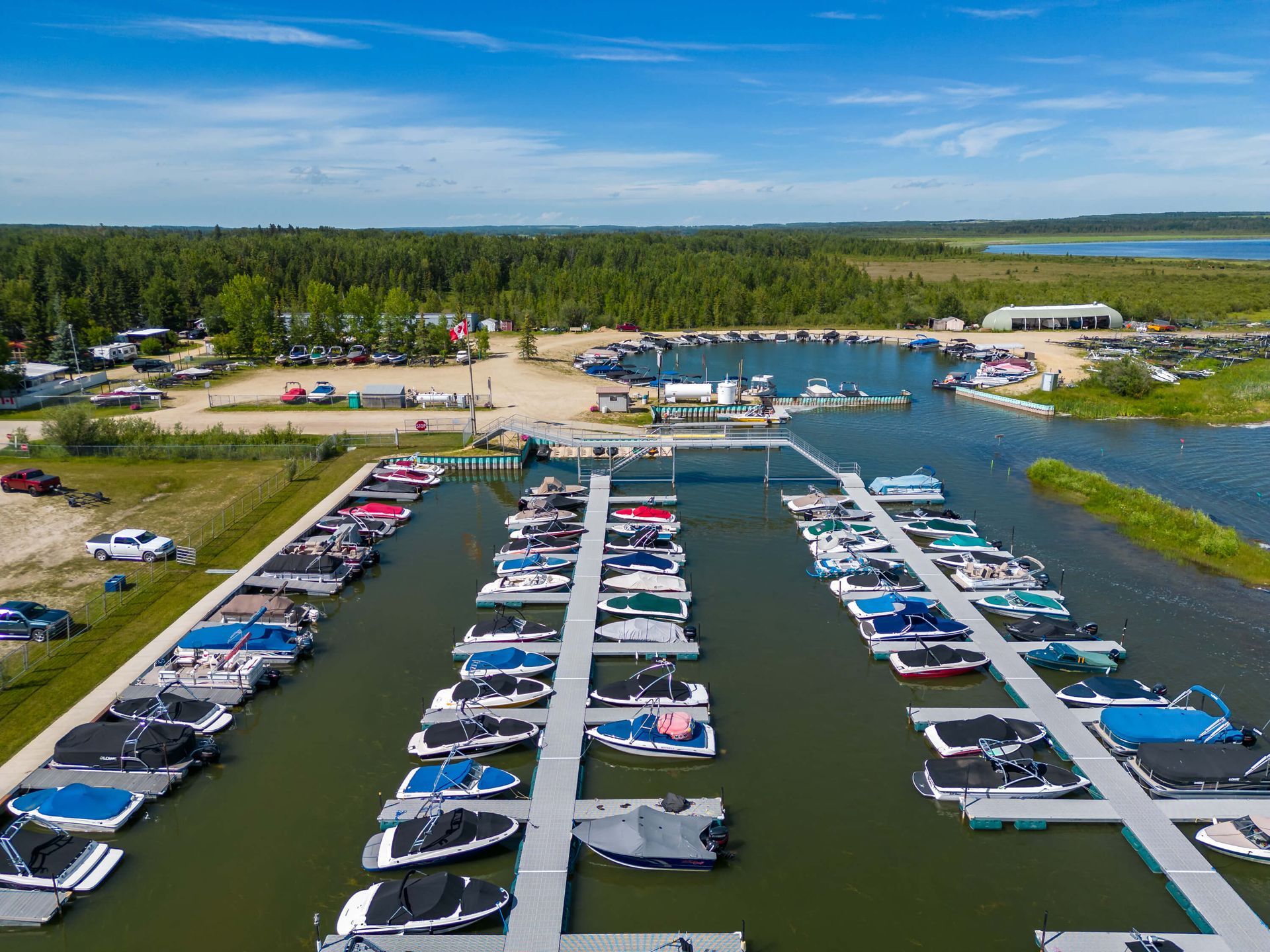 Boating dock of Hilltop Hideaway, a Rimbey Gull Lake short-term rental hosted by Aisling Baile Property Management.