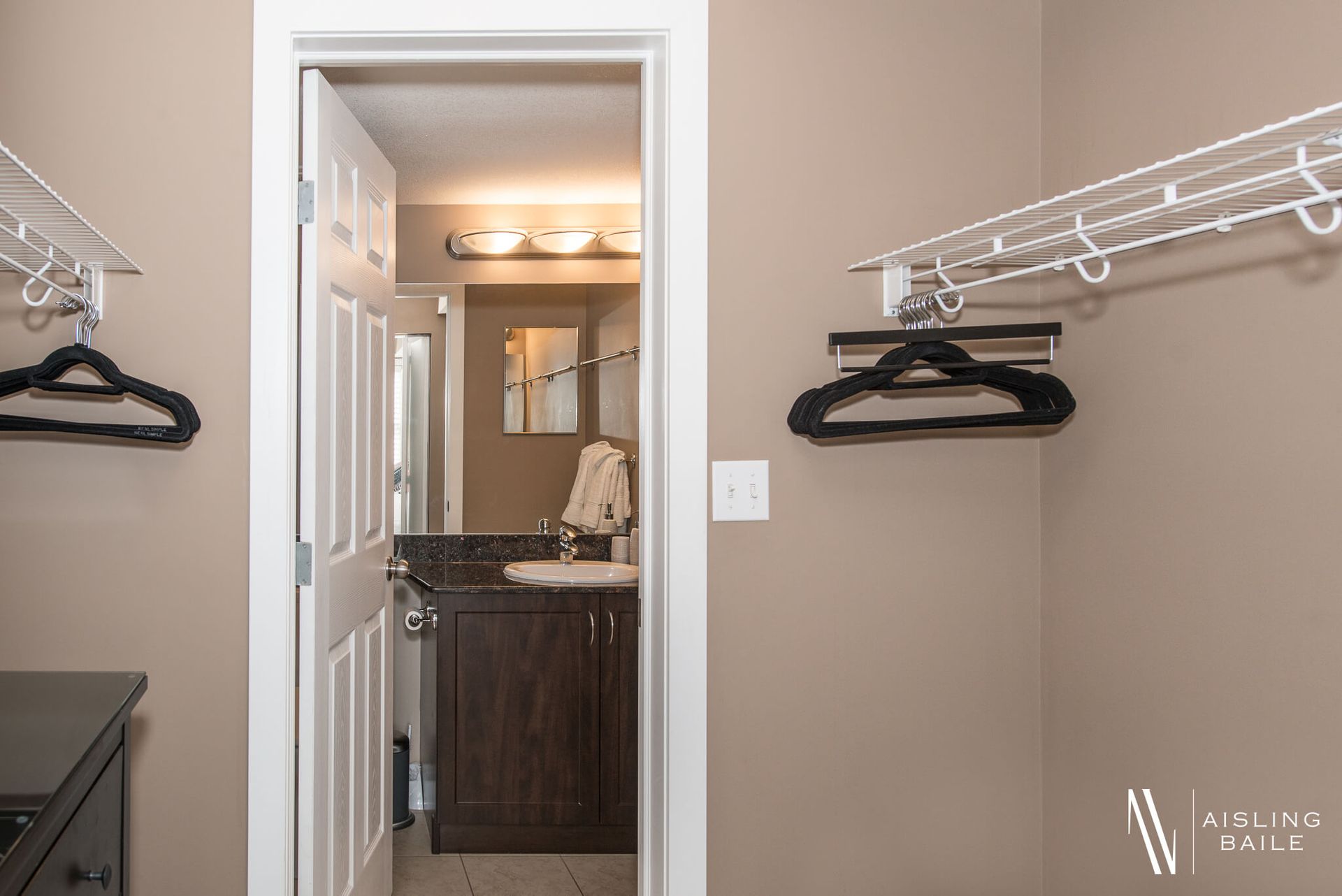 Walk-through closet of the Stylish condo of Lake Windermere Pointe in Invermere, a BC Vacation Rental hosted by Aisling Baile Property Management.
