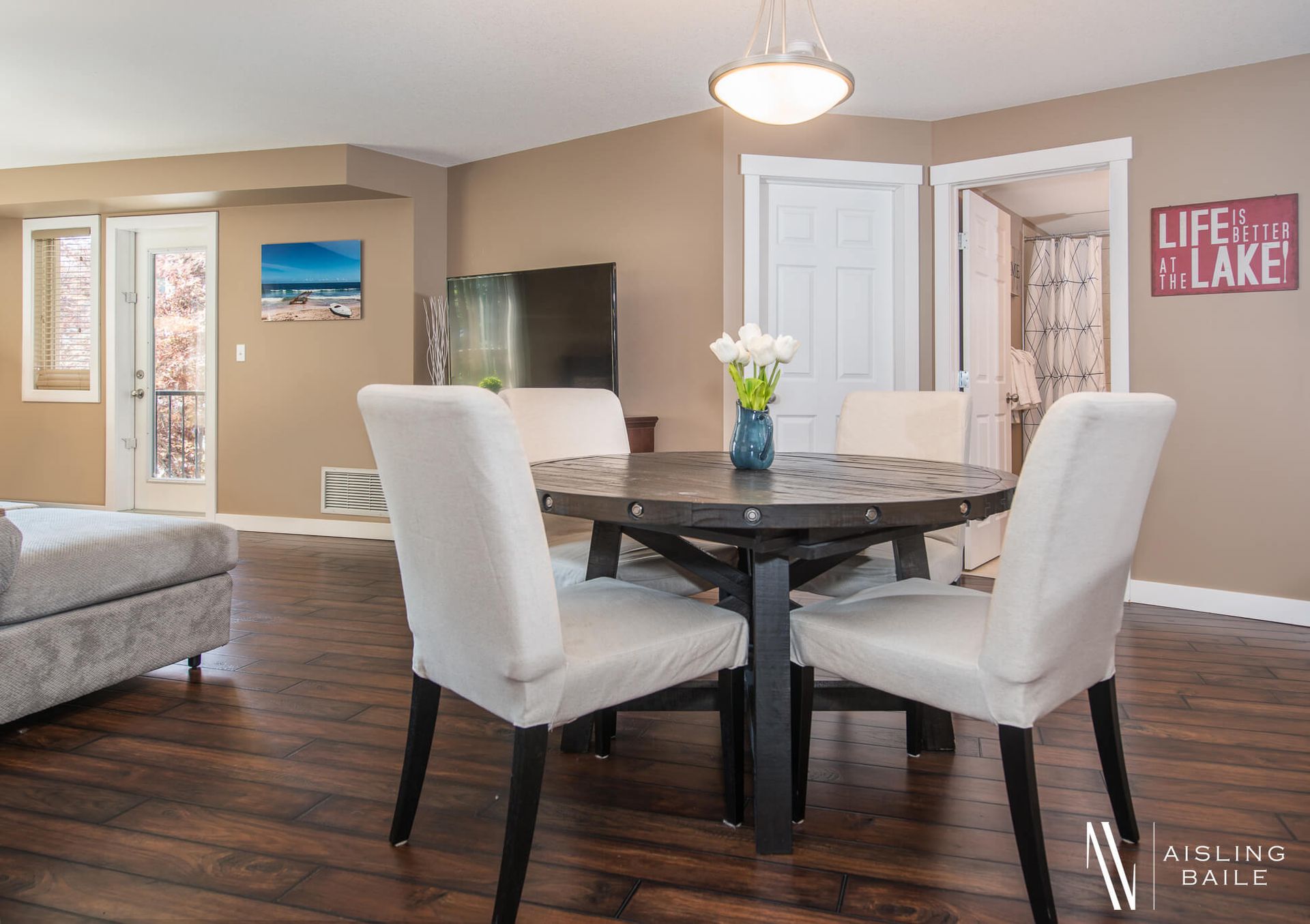 Dining table at the Stylish condo of Lake Windermere Pointe in Invermere, a BC Vacation Rental hosted by Aisling Baile Property Management.