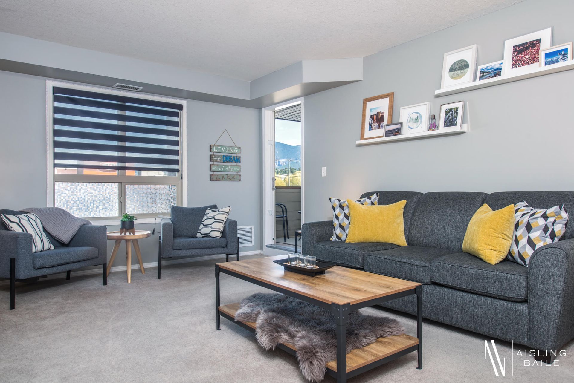 Living room at the Trendy condo at Lake Windermere Pointe in Invermere, a BC Vacation Rental hosted by Aisling Baile Property Management.