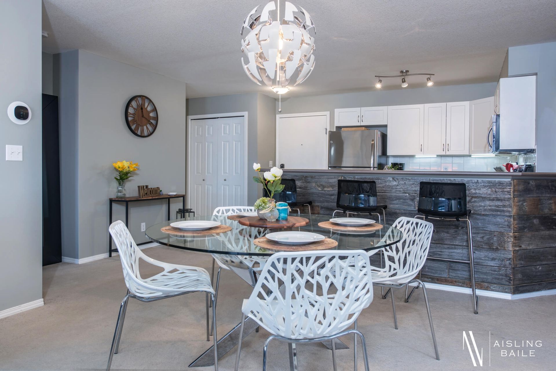 Dining table at the Trendy condo at Lake Windermere Pointe in Invermere, a BC Vacation Rental hosted by Aisling Baile Property Management.