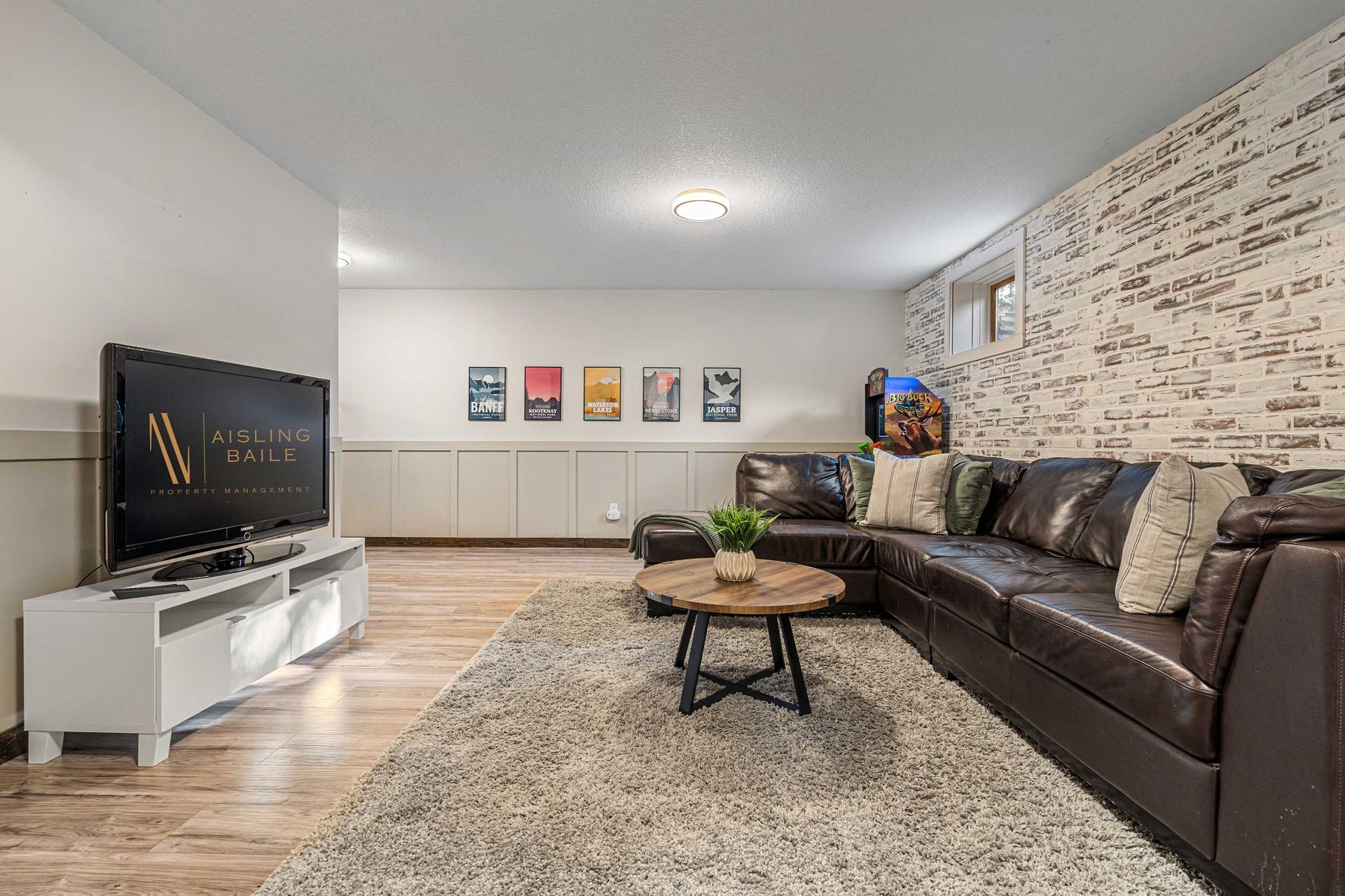 Games room with arcade games of the Canterbury Lodge, an Invermere BC Vacation Rental hosted by Aisling Baile Property Management.