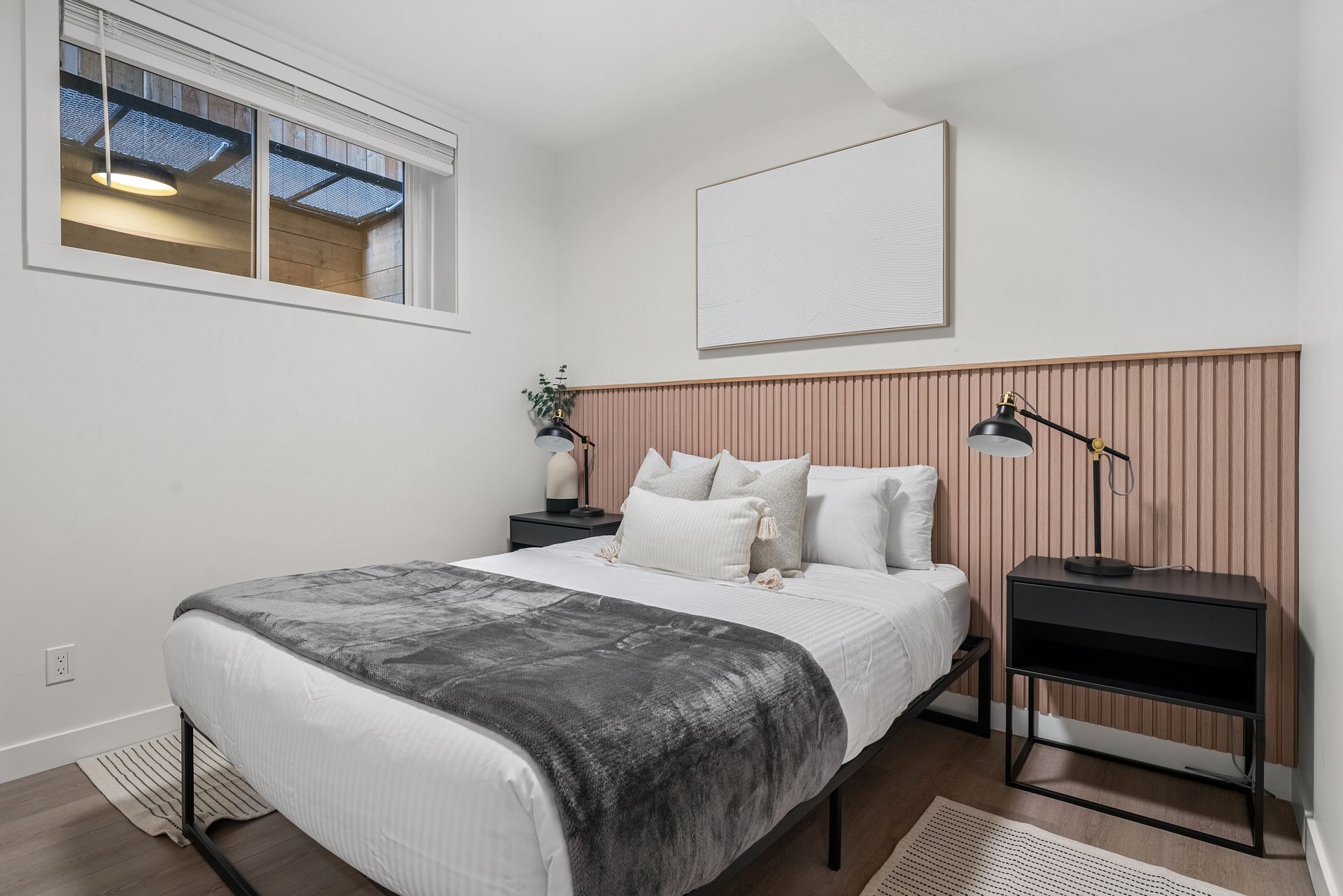 La Petite, a brand new basement suite in the Kensington neighbourhood with a shared hot tub and space for 4 guests | Aisling Baile Property Management.