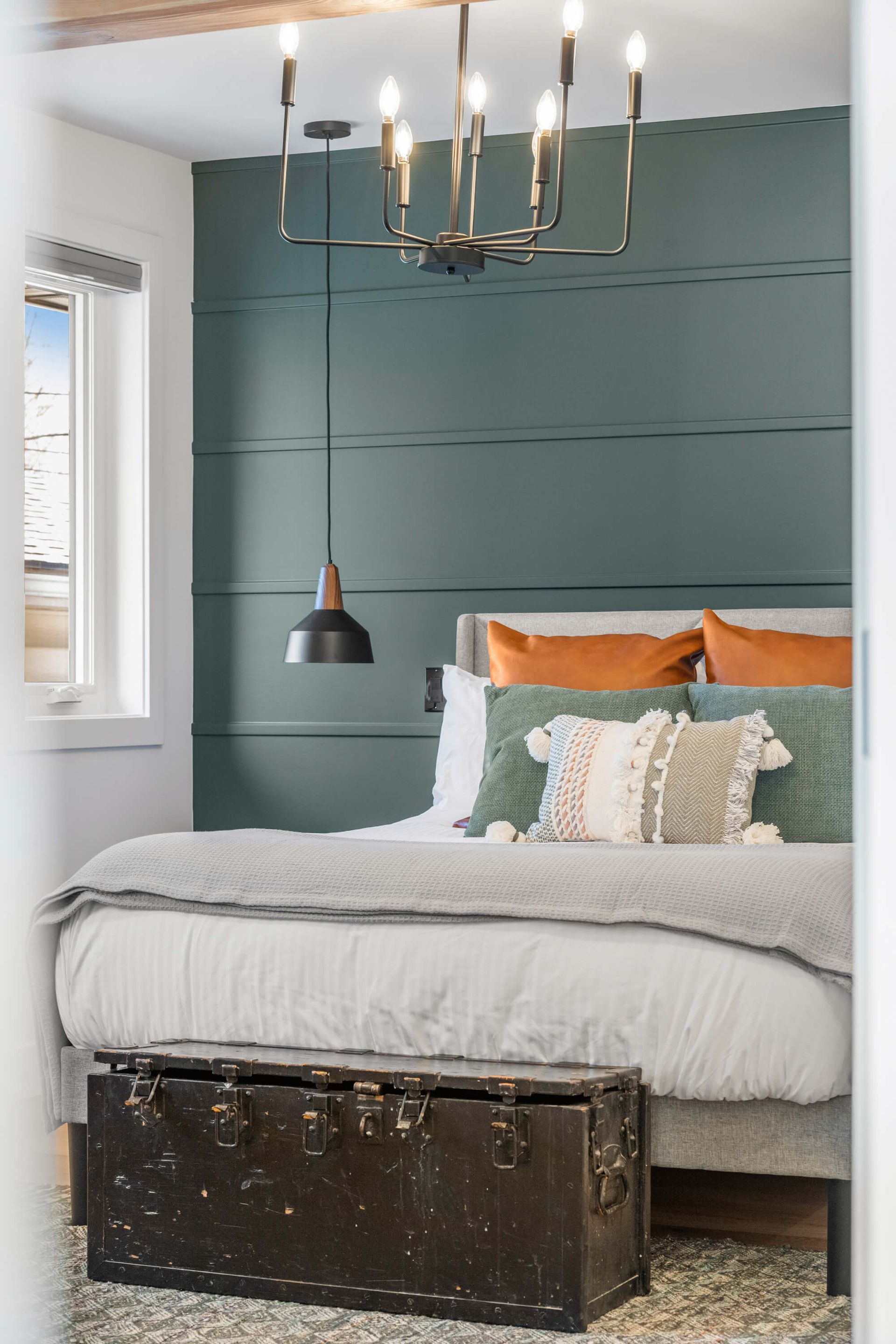 Peek inside the primary bedroom of the Duke, a short-term rental in Calgary.