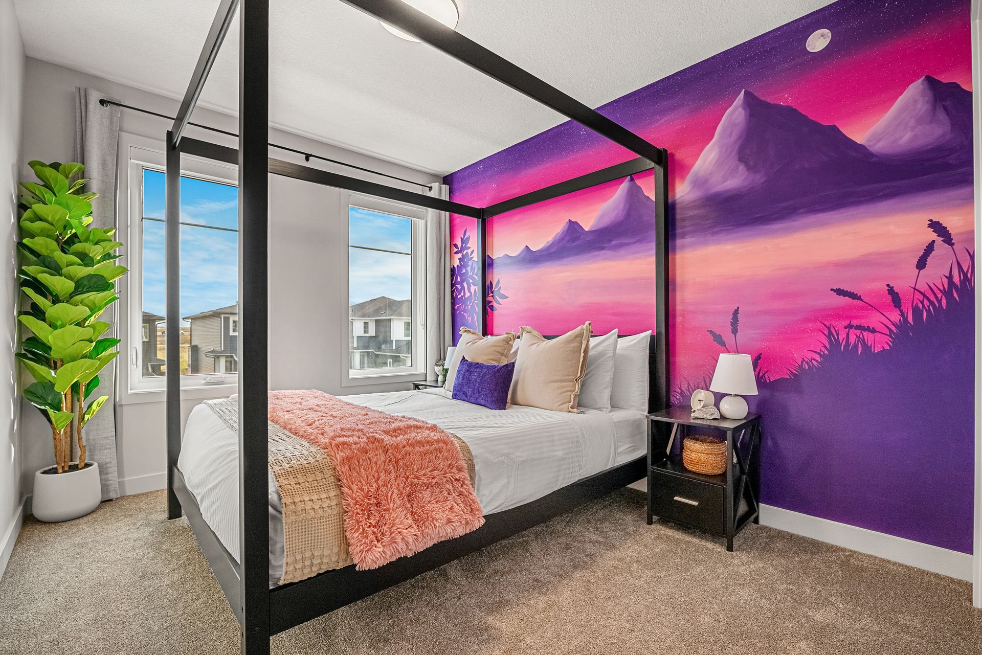 A living room with a large sectional couch and a coffee table.