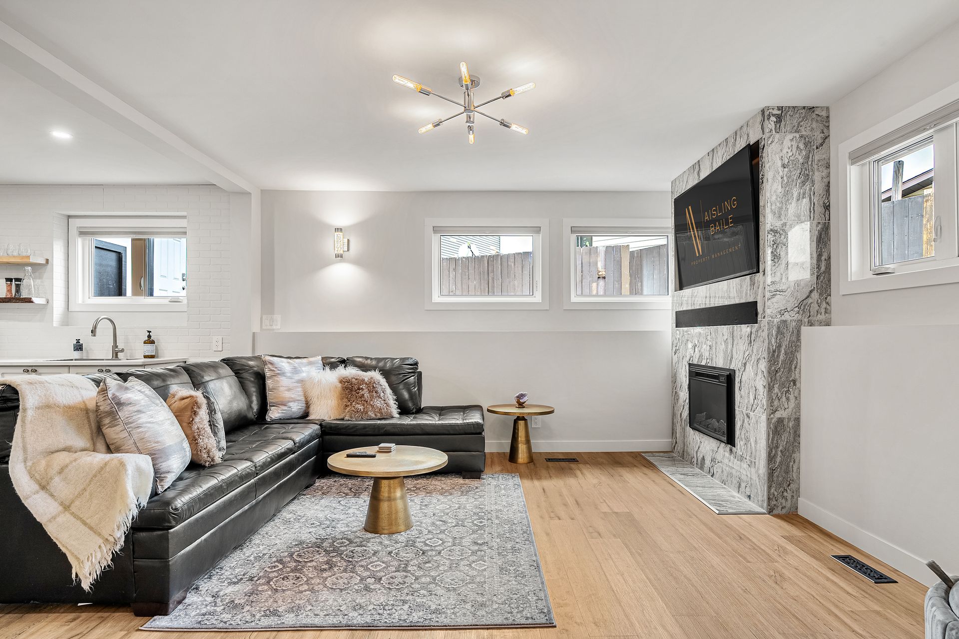 A living room filled with furniture and a flat screen tv.